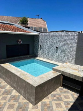 Casa agradável com pequena piscina !